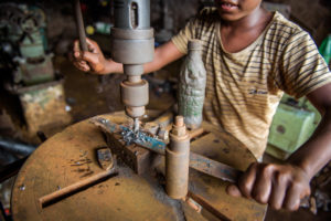 Child involved in child labor in Bangladesh.