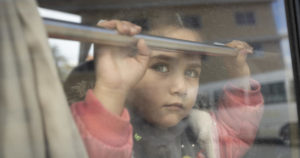Syrian refugee girl on bus