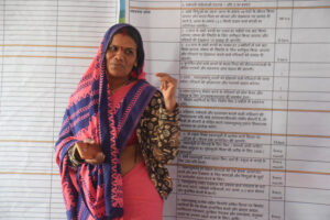 woman in India explains services to community